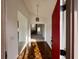 Inviting foyer with wood floors, bright red front door, and open view into the spacious living area at 3774 Annandale Dr., Myrtle Beach, SC 29577