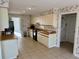 Kitchen featuring tile floors, light wood cabinets, and modern appliances at 3774 Annandale Dr., Myrtle Beach, SC 29577