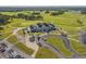 Expansive clubhouse boasting well-manicured lawns, ample parking, and convenient golf cart storage at 5012 Lindrick Ct., Myrtle Beach, SC 29579