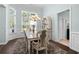 Dining room with a chandelier, area rug, and wainscoting at 5012 Lindrick Ct., Myrtle Beach, SC 29579