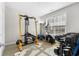 Bright workout room with fitness equipment, including weights, elliptical, and weight-lifting system at 5012 Lindrick Ct., Myrtle Beach, SC 29579