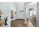 Spacious foyer with hardwood floors, pendant lighting, white columns, and views to other rooms at 5012 Lindrick Ct., Myrtle Beach, SC 29579