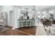 Living space with a breakfast bar, open kitchen, and hardwood flooring at 5012 Lindrick Ct., Myrtle Beach, SC 29579