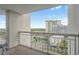 Balcony view showing nearby buildings, a distant pond, and the surrounding landscape at 9820 Queensway Blvd. # 1501, Myrtle Beach, SC 29572