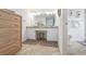 Well-lit bathroom with double sinks, granite countertops, a vanity, and tiled flooring at 9820 Queensway Blvd. # 1501, Myrtle Beach, SC 29572