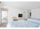 Cozy bedroom with two beds, a balcony, and a television on a dresser at 9820 Queensway Blvd. # 1501, Myrtle Beach, SC 29572