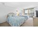 Inviting bedroom with two queen beds, balcony access, and stylish decor at 9820 Queensway Blvd. # 1501, Myrtle Beach, SC 29572