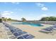 Inviting community pool with ample seating for residents and guests at 9820 Queensway Blvd. # 1501, Myrtle Beach, SC 29572