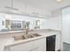 Open kitchen featuring bright cabinets and a seamless transition into the living space with scenic views at 9820 Queensway Blvd. # 1501, Myrtle Beach, SC 29572