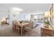 Open living space features dining area, balcony access and comfortable seating, providing the perfect retreat at 9820 Queensway Blvd. # 1501, Myrtle Beach, SC 29572