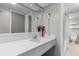 Bright bathroom featuring a wide mirror, sink, and floral decor at 1501 S Ocean Blvd. # 1541, Myrtle Beach, SC 29577