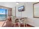 A dining area with ocean views and beach decor at 1501 S Ocean Blvd. # 1541, Myrtle Beach, SC 29577