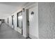 Hallway with windows and doors, leading to rooms and amenities, in a well-lit, modern setting at 1501 S Ocean Blvd. # 1541, Myrtle Beach, SC 29577