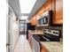 Modern kitchen featuring stainless steel appliances, granite countertops, and ample cabinet space at 1501 S Ocean Blvd. # 1541, Myrtle Beach, SC 29577