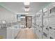 Well lit communal laundry room with multiple washers and dryers at 1501 S Ocean Blvd. # 1541, Myrtle Beach, SC 29577