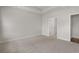 Comfortable bedroom with neutral carpeting, paint, and adjacent closet at 2412 Campton Loop, Conway, SC 29527