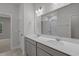 Bathroom featuring double sinks, large mirror, tile flooring and a shower at 2441 Campton Loop, Conway, SC 29527