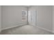 Bedroom featuring neutral carpet, a window and closet with double doors at 2441 Campton Loop, Conway, SC 29527