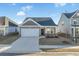 Charming single-story home featuring a covered entryway, garage, and a well-manicured lawn at 2472 Campton Loop, Conway, SC 29527