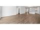 Spacious open-concept living area with hardwood floors and lots of natural light at 2472 Campton Loop, Conway, SC 29527