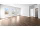 Living area with hard surface flooring and large windows that provide natural light at 2472 Campton Loop, Conway, SC 29527