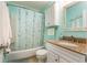 Bathroom featuring white vanity, granite counters, and a shower with a decorative curtain at 609 Hillside Dr. S # C-10, North Myrtle Beach, SC 29582