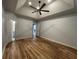 Open Bedroom featuring vaulted ceiling, wood floors, and doorway to additional rooms at 620 Sunnyside Dr. # 102, Murrells Inlet, SC 29576