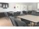 Common area with tables, chairs, and a tv at 620 Sunnyside Dr. # 102, Murrells Inlet, SC 29576