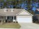 Charming one-story home with a two-car garage and well-maintained landscaping at 620 Sunnyside Dr. # 102, Murrells Inlet, SC 29576