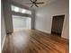 Inviting living room featuring a ceiling fan and natural light from clerestory windows at 620 Sunnyside Dr. # 102, Murrells Inlet, SC 29576
