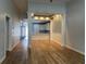 Open-concept layout from living space showcasing the kitchen and hallway at 620 Sunnyside Dr. # 102, Murrells Inlet, SC 29576