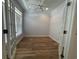 Bright and airy office with wood floors, French doors, and ample natural light at 620 Sunnyside Dr. # 102, Murrells Inlet, SC 29576