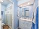 Bright bathroom featuring a vanity with cabinet storage and a shower with curtain at 86 Shadow Moss Pl. # 86, North Myrtle Beach, SC 29582