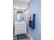 Bathroom with single sink vanity, a large mirror, and wall-mounted towel rack at 86 Shadow Moss Pl. # 86, North Myrtle Beach, SC 29582