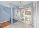 Bright dining area with outdoor access, decorative chairs and stairwell entrance at 86 Shadow Moss Pl. # 86, North Myrtle Beach, SC 29582