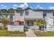 Charming two-story townhome with a cozy front patio and well-maintained landscaping, offering a welcoming curb appeal at 86 Shadow Moss Pl. # 86, North Myrtle Beach, SC 29582
