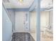 Bright foyer with tile flooring, white door with decorative glass, and staircase, creating an inviting entrance at 86 Shadow Moss Pl. # 86, North Myrtle Beach, SC 29582