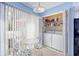 Light-filled laundry area with washer, dryer, and sliding doors to the outside at 86 Shadow Moss Pl. # 86, North Myrtle Beach, SC 29582