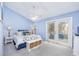 Inviting main bedroom with a ceiling fan and balcony access at 86 Shadow Moss Pl. # 86, North Myrtle Beach, SC 29582