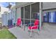 Cozy screened porch features outdoor seating, creating a relaxing space to enjoy the fresh air at 86 Shadow Moss Pl. # 86, North Myrtle Beach, SC 29582