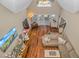 Bright and open living room with hardwood floors, high ceilings, and access to an outdoor patio at 865 River Rd., Tabor City, NC 28463