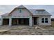 Newly constructed home with gray shingle roof and attached garage at 1038 Jase Dr., Longs, SC 29568