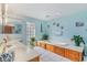 Light filled bathroom boasts a soaking tub, double vanity, and tiled floor at 1692 S Morgan Ave., Andrews, SC 29510
