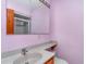 Bathroom featuring a single sink vanity with integrated toilet and shower at 1692 S Morgan Ave., Andrews, SC 29510