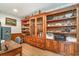 Home office with custom built-in shelving and a dedicated workspace at 1692 S Morgan Ave., Andrews, SC 29510