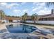 Backyard featuring an in-ground pool with diving board, a covered entertaining area, and views of the property at 1692 S Morgan Ave., Andrews, SC 29510