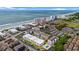 Aerial view of a coastal community with condos, pools, and beach access at 191 Maison Dr. # B203, Myrtle Beach, SC 29572