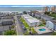Aerial view of condo community with ocean view, pool, and ample parking in a coastal setting at 191 Maison Dr. # B203, Myrtle Beach, SC 29572