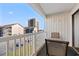 Balcony with seating and views of the surrounding buildings and street at 191 Maison Dr. # B203, Myrtle Beach, SC 29572