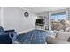 Comfortable living room featuring a balcony and neutral tones at 191 Maison Dr. # B203, Myrtle Beach, SC 29572